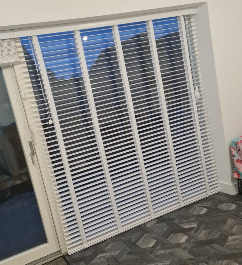 White faux wood venetian blind