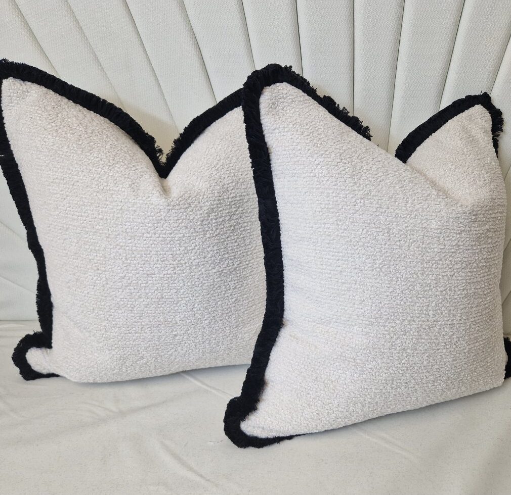 Boucle Snow Cushion with black fringe